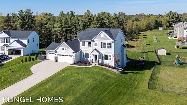 9235 Bigleaf Dr, West Olive, MI 49460 - view of front facade featuring a garage, a playground, concrete driveway, and a porch
