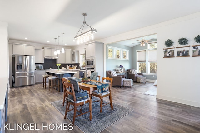 9235 Bigleaf Dr, West Olive, MI 49460 - dining area featuring dark wood-style floors, baseboards, recessed lighting, and a ceiling fan