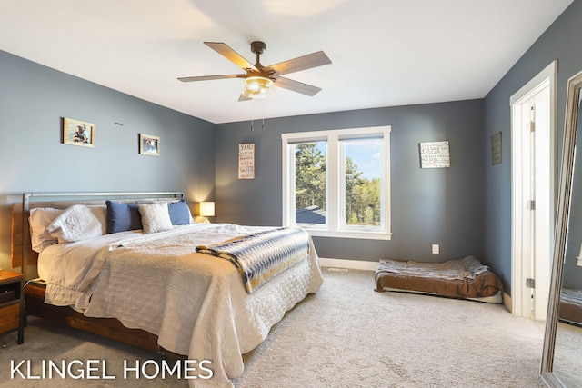 9235 Bigleaf Dr, West Olive, MI 49460 - carpeted bedroom featuring baseboards and ceiling fan