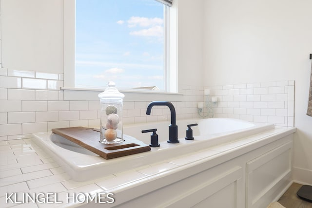 9235 Bigleaf Dr, West Olive, MI 49460 - bathroom with a bath