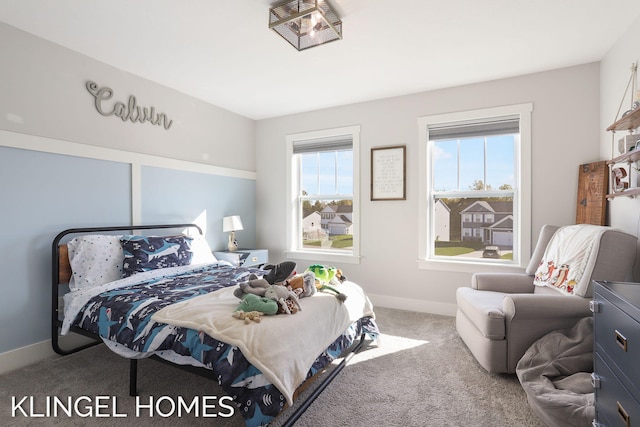 9235 Bigleaf Dr, West Olive, MI 49460 - bedroom featuring carpet floors and baseboards