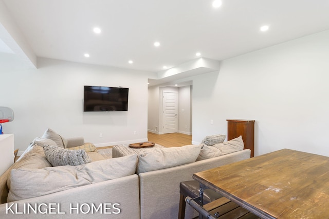 9235 Bigleaf Dr, West Olive, MI 49460 - living area featuring recessed lighting, wood finished floors, and baseboards