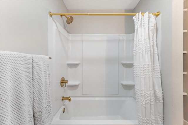 bathroom with shower / bathtub combination with curtain