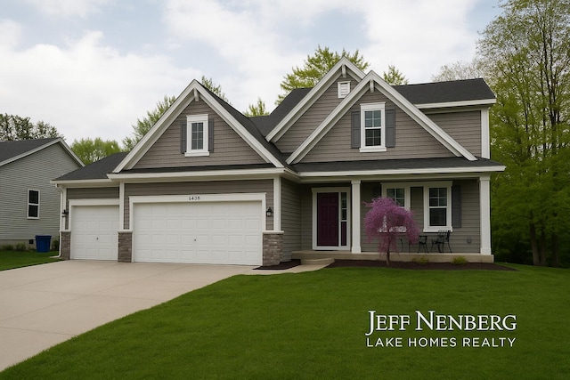 view of front of property featuring a porch, a front yard, concrete driveway, a garage, and stone siding