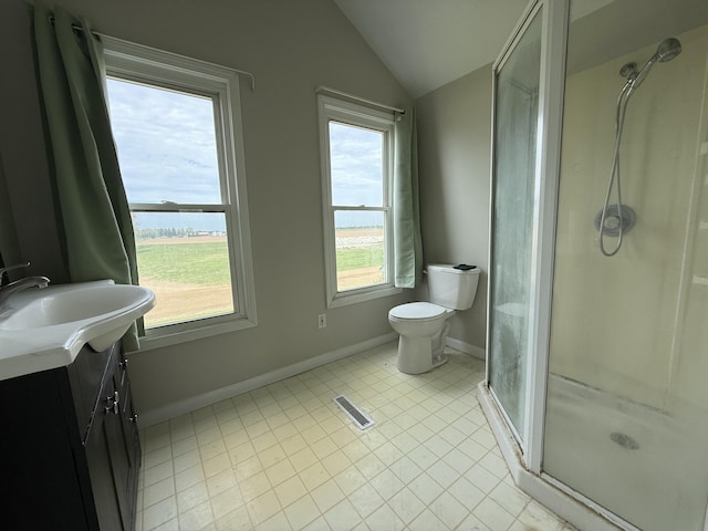 22011 Springer, Vicksburg, MI 49097 - bathroom with lofted ceiling, a shower stall, baseboards, tile patterned flooring, and toilet