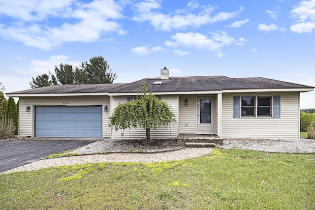 6001 Dover Ln, Traverse City, MI 49684 - single story home featuring a garage, driveway, a front lawn, and a chimney