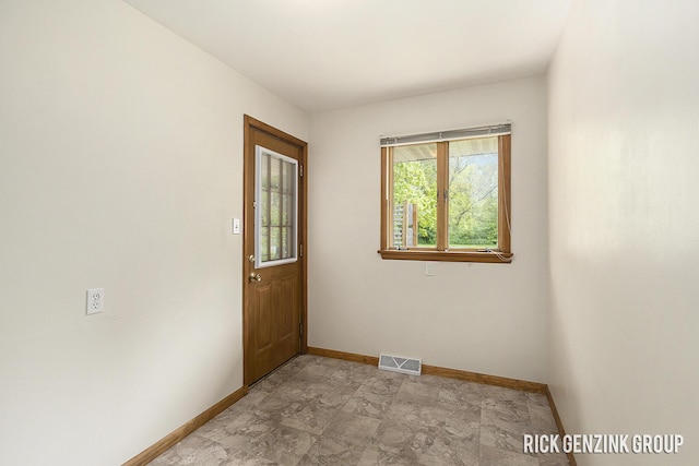 28 W 34th St, Holland, MI 49423 - empty room with baseboards
