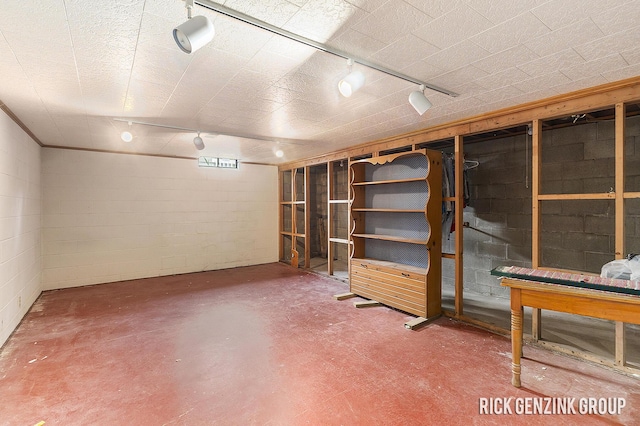 28 W 34th St, Holland, MI 49423 - finished below grade area featuring track lighting and concrete block wall