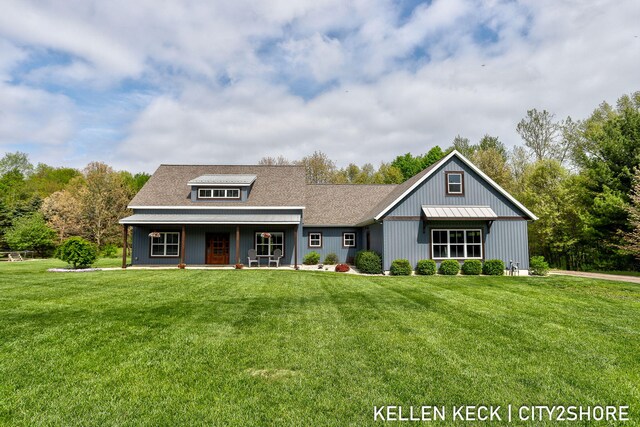 2263 136th Ave, Dorr, MI 49323 - view of front of property with a porch and a front yard