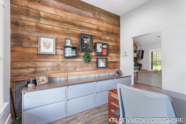 2263 136th Ave, Dorr, MI 49323 - detailed view of wood walls and wood finished floors