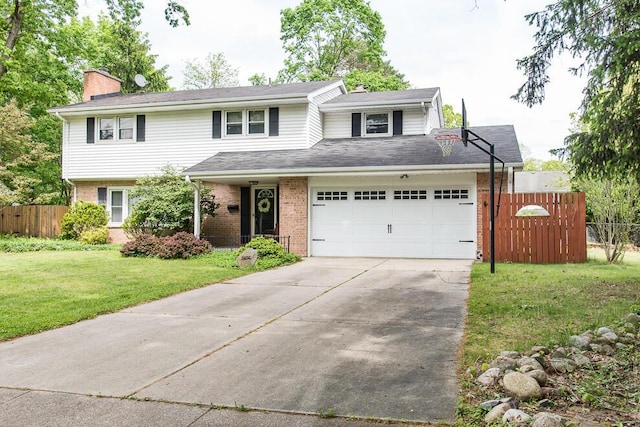 2707 Lomond Dr, Kalamazoo, MI 49008 - traditional-style house with brick siding, driveway, a chimney, and a garage