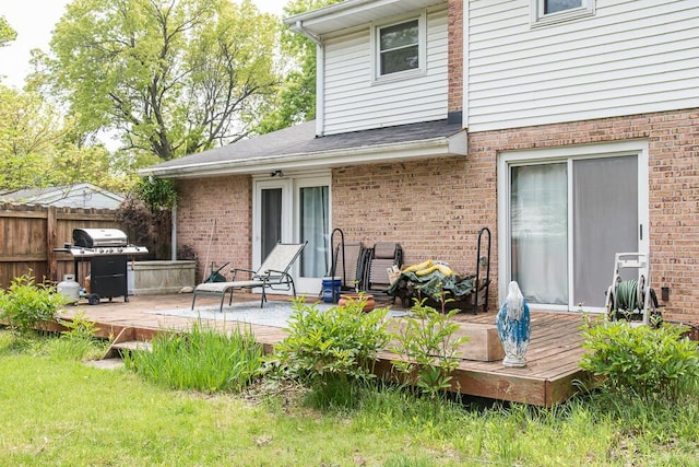 2707 Lomond Dr, Kalamazoo, MI 49008 - rear view of property with a deck and brick siding