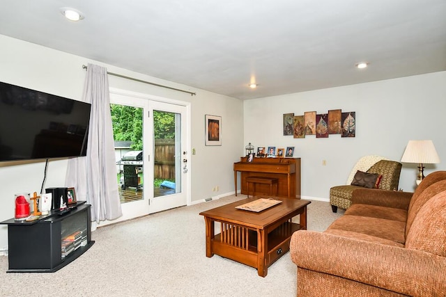 2707 Lomond Dr, Kalamazoo, MI 49008 - living area with carpet floors, baseboards, and recessed lighting