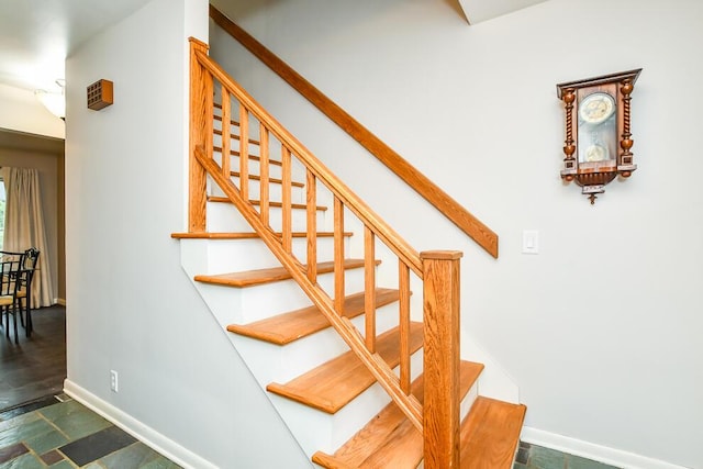 2707 Lomond Dr, Kalamazoo, MI 49008 - stairs featuring baseboards