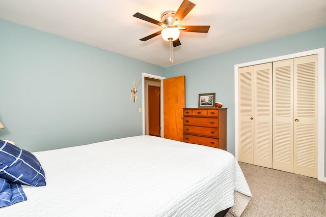 2707 Lomond Dr, Kalamazoo, MI 49008 - bedroom featuring a closet, a ceiling fan, and carpet