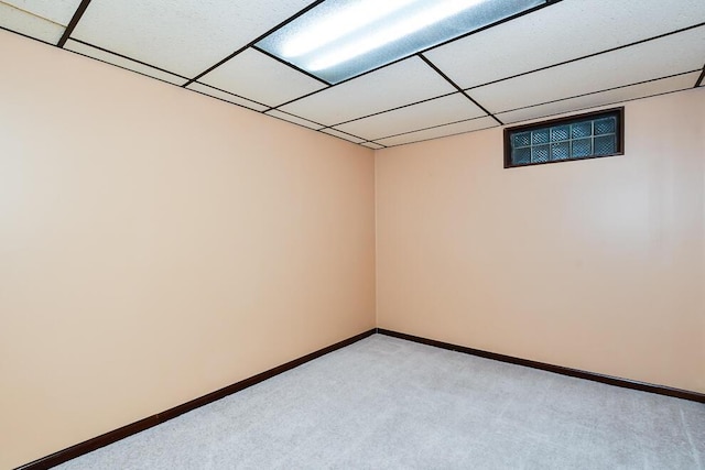 2707 Lomond Dr, Kalamazoo, MI 49008 - unfurnished room with light colored carpet, baseboards, and a drop ceiling
