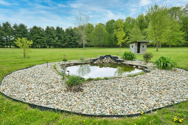 3725 S Creek Ln, Dryden, MI 48428 - view of green lawn featuring an outdoor structure and a shed