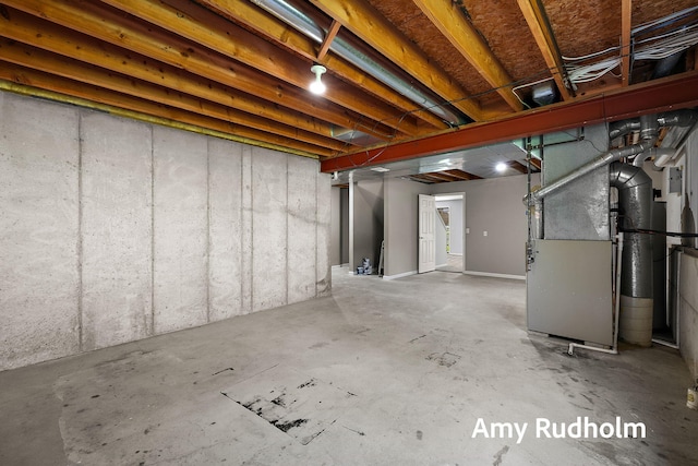 1995 W Glen Ct, Norton Shores, MI 49441 - unfinished basement featuring heating unit
