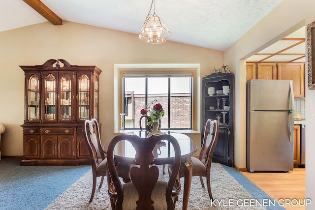 dining room featuring a chandelier