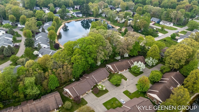 aerial perspective of suburban area featuring a nearby body of water