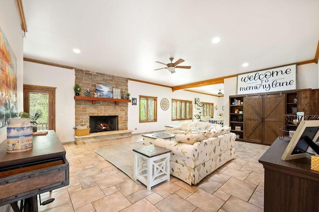 16431 Glassman Rd, Union Pier, MI 49129 - living room featuring crown molding, a ceiling fan, stone tile floors, a fireplace, and recessed lighting