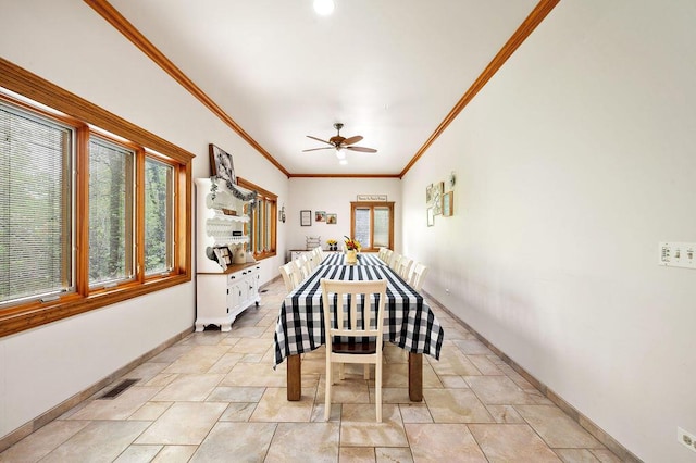 16431 Glassman Rd, Union Pier, MI 49129 - dining area featuring ornamental molding, light stone finish flooring, ceiling fan, and baseboards