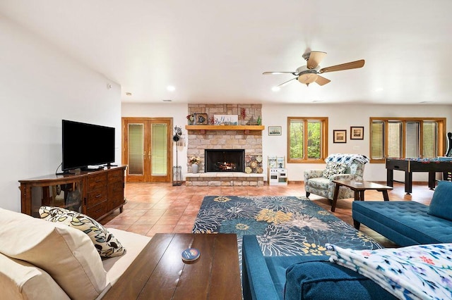 16431 Glassman Rd, Union Pier, MI 49129 - living area featuring ceiling fan, french doors, light tile patterned flooring, a fireplace, and recessed lighting