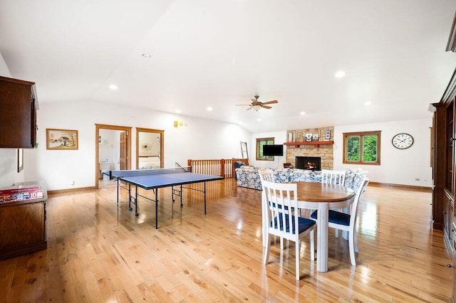 16431 Glassman Rd, Union Pier, MI 49129 - playroom featuring a ceiling fan, a stone fireplace, lofted ceiling, light wood-style floors, and recessed lighting