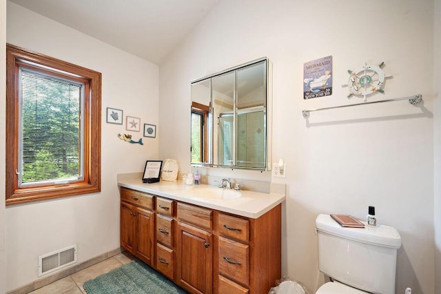 16431 Glassman Rd, Union Pier, MI 49129 - full bathroom featuring toilet, vanity, tile patterned flooring, an enclosed shower, and baseboards
