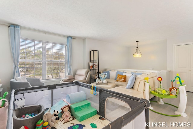 living room with a textured ceiling