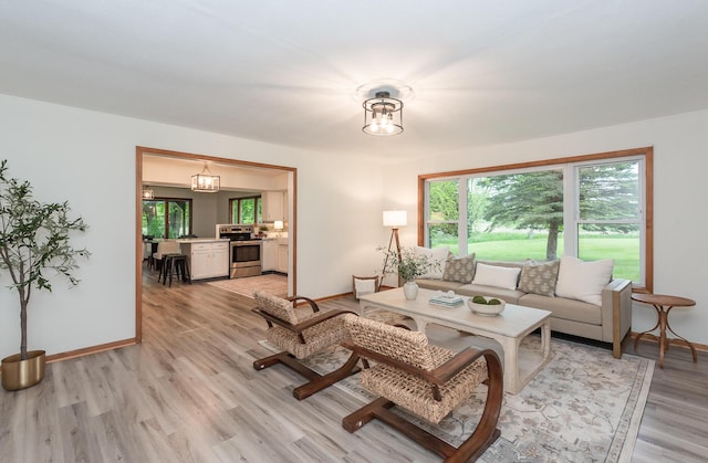16436 45th Ave, Barryton, MI 49305 - living area with light wood-type flooring and baseboards