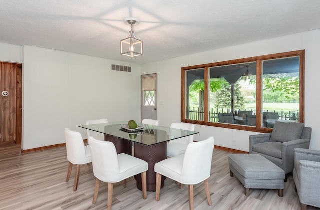 16436 45th Ave, Barryton, MI 49305 - dining area featuring light wood-style flooring and baseboards