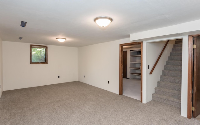 16436 45th Ave, Barryton, MI 49305 - below grade area featuring carpet and stairs