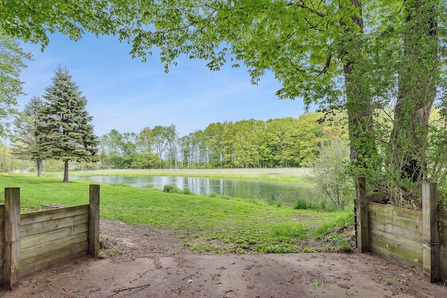 16436 45th Ave, Barryton, MI 49305 - view of green lawn featuring a water view and a view of trees