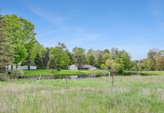 16436 45th Ave, Barryton, MI 49305 - view of yard with a water view and a forest view