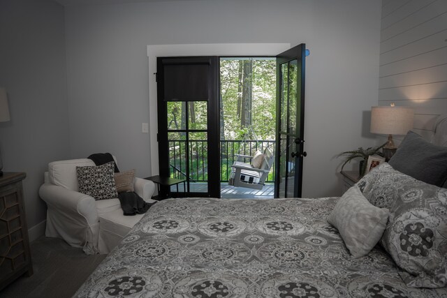 8182 Country Rail Dr SW, Byron Center, MI 49315 - bedroom with access to outside and wood finished floors