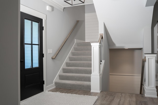 8182 Country Rail Dr SW, Byron Center, MI 49315 - entrance foyer featuring wood finished floors and stairway