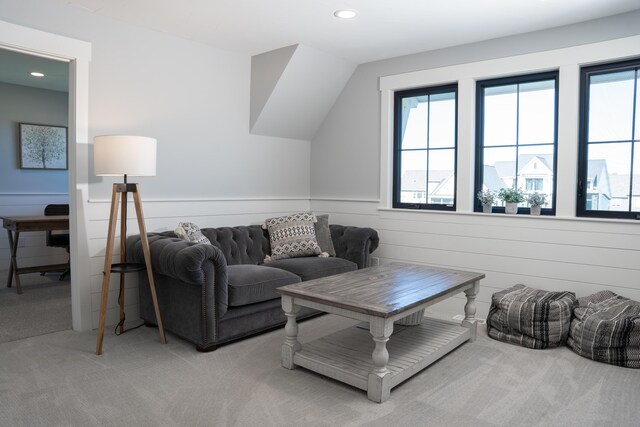 8182 Country Rail Dr SW, Byron Center, MI 49315 - living room featuring light colored carpet, healthy amount of natural light, a wainscoted wall, and recessed lighting