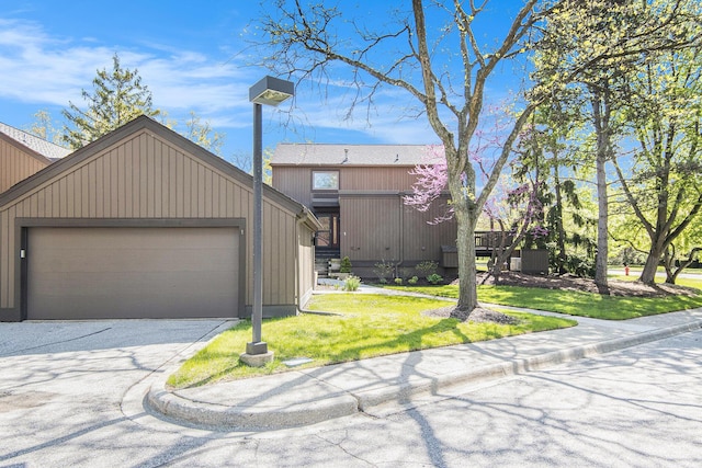 1 Northwick Ct, Ann Arbor, MI 48105 - mid-century inspired home with a front yard and an outbuilding