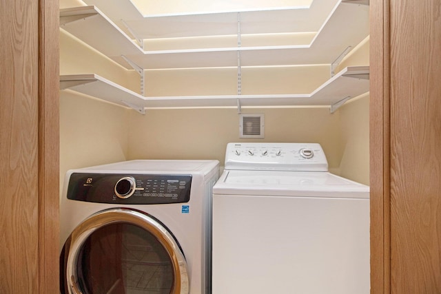 1 Northwick Ct, Ann Arbor, MI 48105 - washroom with washing machine and clothes dryer