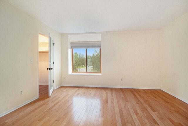 1 Northwick Ct, Ann Arbor, MI 48105 - unfurnished room featuring light wood finished floors and baseboards