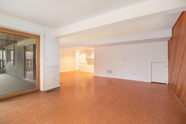 1 Northwick Ct, Ann Arbor, MI 48105 - spare room with a wainscoted wall and a decorative wall
