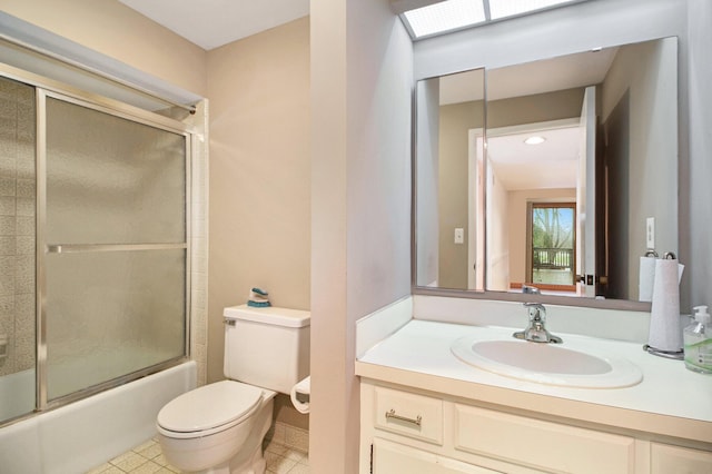 1 Northwick Ct, Ann Arbor, MI 48105 - full bath with toilet, enclosed tub / shower combo, vanity, and tile patterned flooring