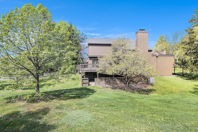 1 Northwick Ct, Ann Arbor, MI 48105 - view of grassy yard featuring a wooden deck