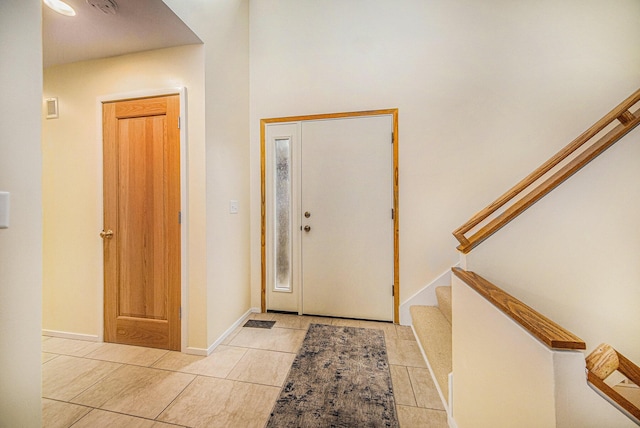 1 Northwick Ct, Ann Arbor, MI 48105 - entrance foyer featuring stairway and light tile patterned floors