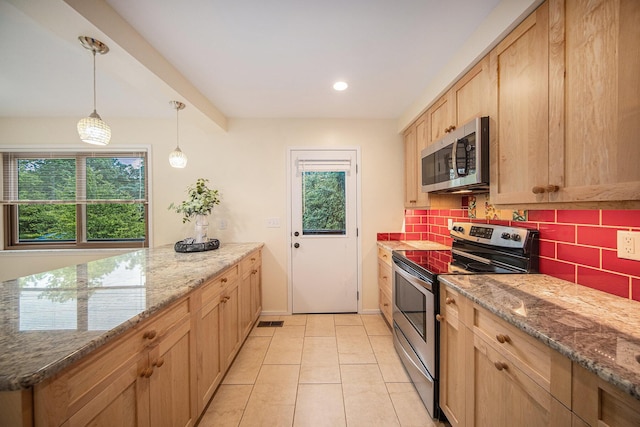 1 Northwick Ct, Ann Arbor, MI 48105 - kitchen with appliances with stainless steel finishes, decorative backsplash, light brown cabinets, stone countertops, and recessed lighting