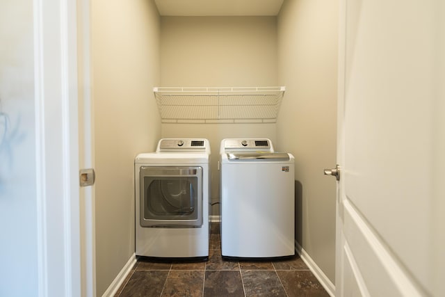 50305 Thatcher St, Canton, MI 48188 - laundry room featuring washing machine and dryer and baseboards