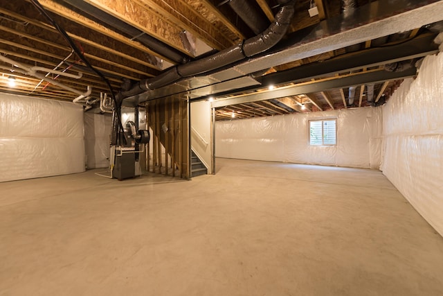 50305 Thatcher St, Canton, MI 48188 - basement featuring heating unit and stairway