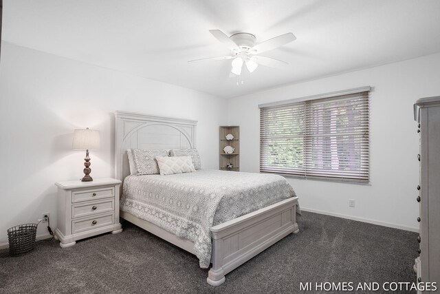 3760 Lakeshore Dr, Holland, MI 49424 - bedroom with dark colored carpet, a ceiling fan, and baseboards