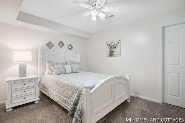 3760 Lakeshore Dr, Holland, MI 49424 - carpeted bedroom with baseboards and a ceiling fan